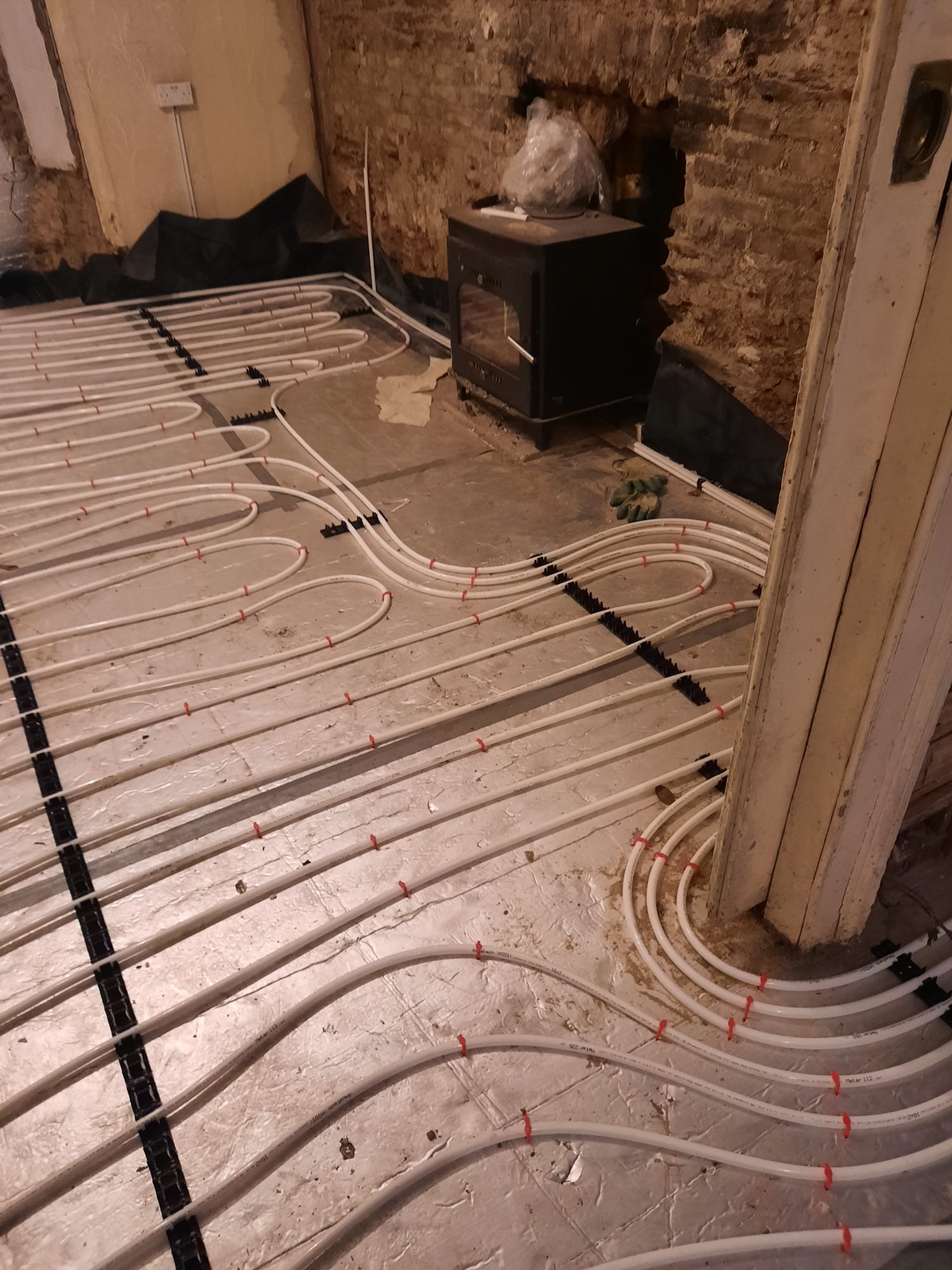 General Heating Services — Underfloor loops set out